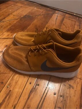 Nike Mustard Yellow Low-Top Sneakers with Gray Swoosh